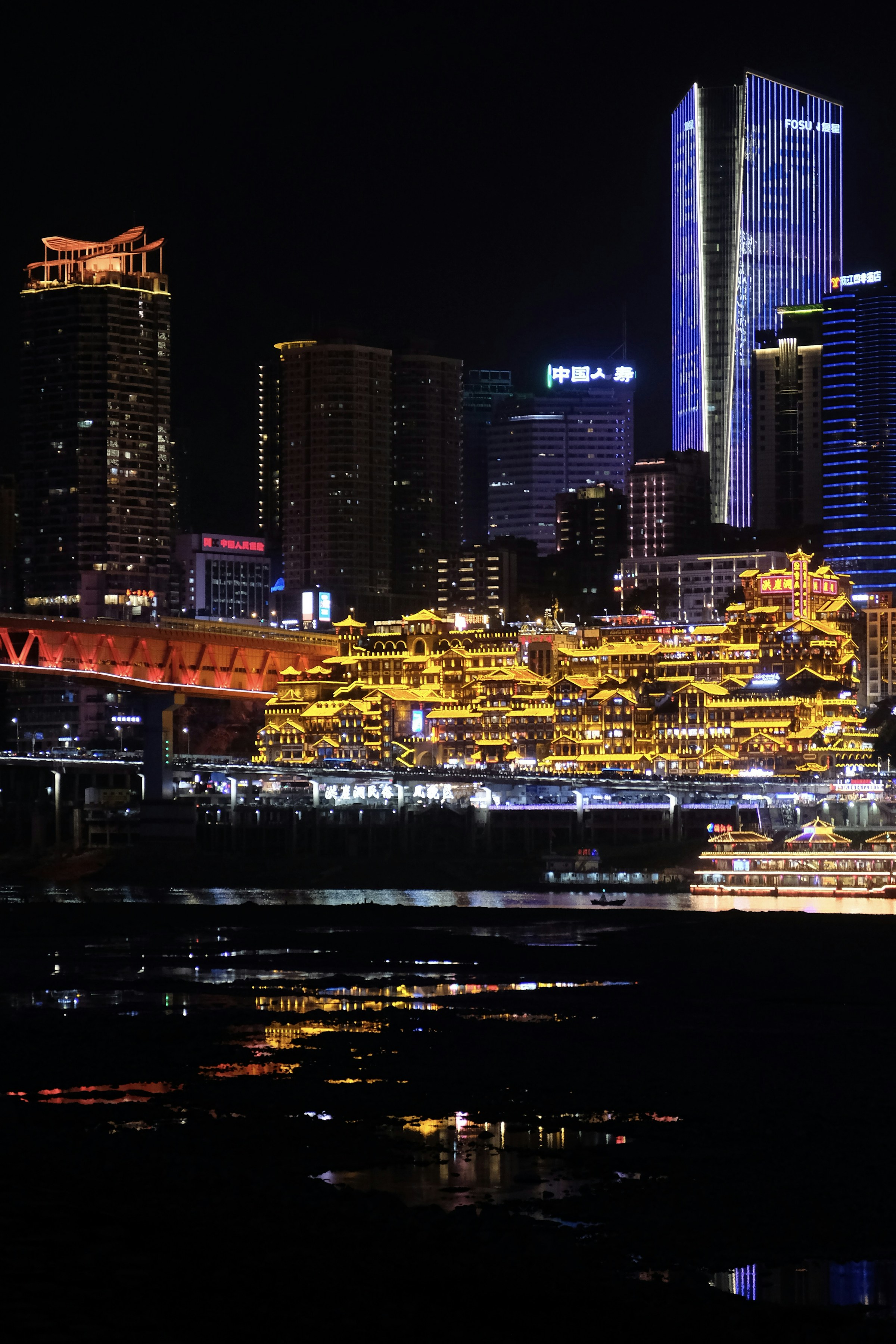 Hongya Cave glowing at night in Chongqing